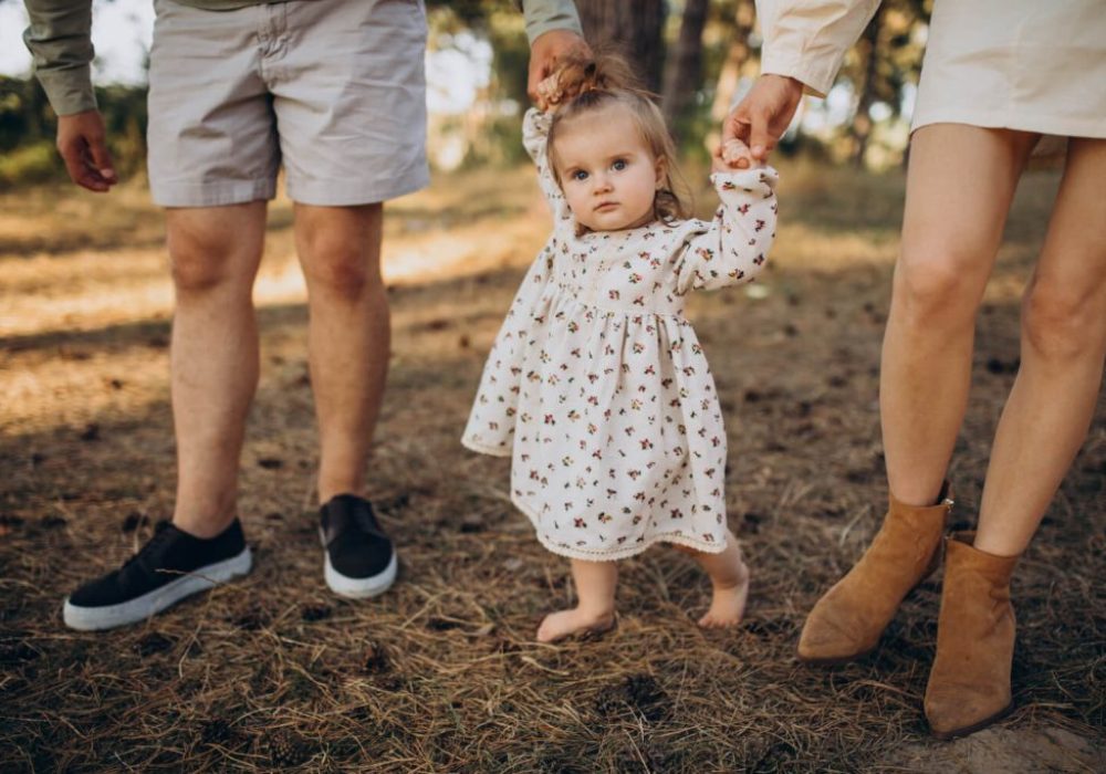 toddler walking park outdoors