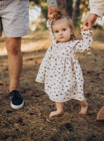 toddler walking park outdoors